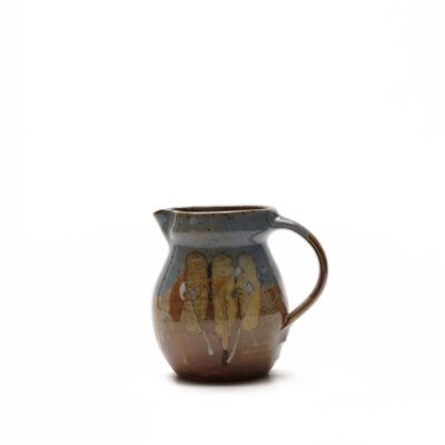 Krug mit bunter Glasur